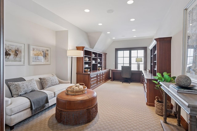 living area featuring recessed lighting and light colored carpet