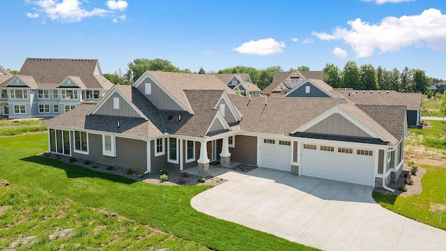 116 Spring Farm Rd, North Oaks, MN 55127 - shingle-style home featuring board and batten siding, an attached garage, driveway, a shingled roof, and a front yard