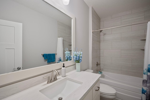 bathroom with shower / tub combo, vanity, and toilet