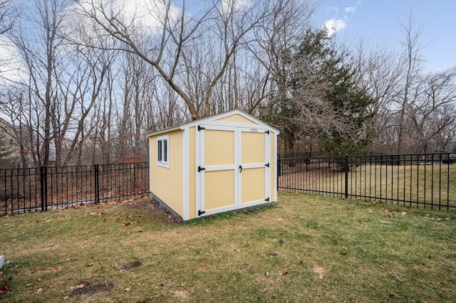 view of shed featuring a fenced backyard