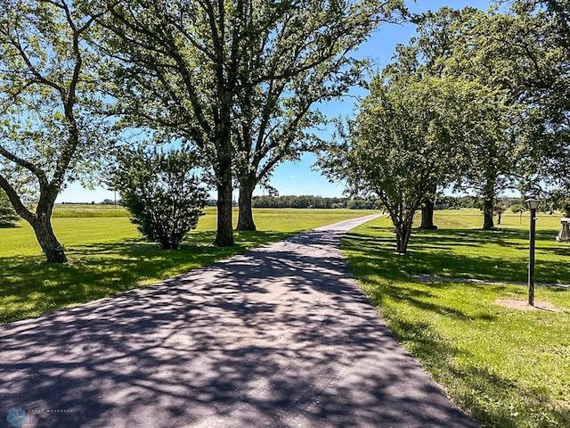 view of street featuring a rural view