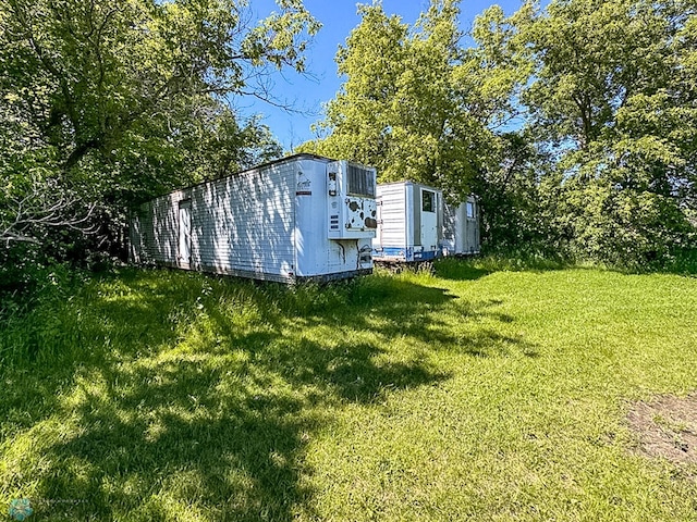 exterior space featuring an outbuilding