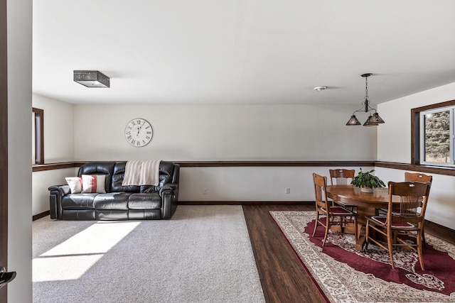 interior space featuring dark wood finished floors and baseboards