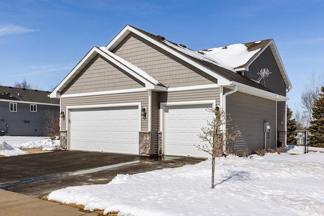 craftsman house featuring a garage