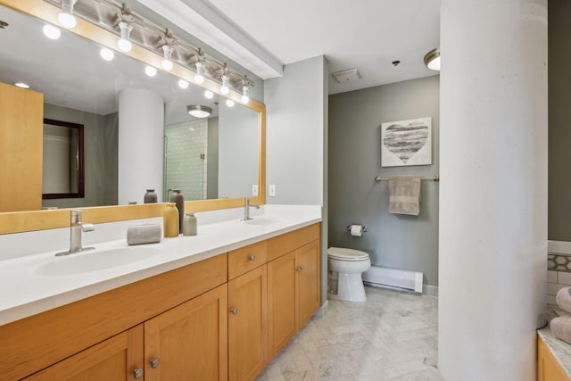 bathroom featuring double vanity, a sink, toilet, and a shower stall