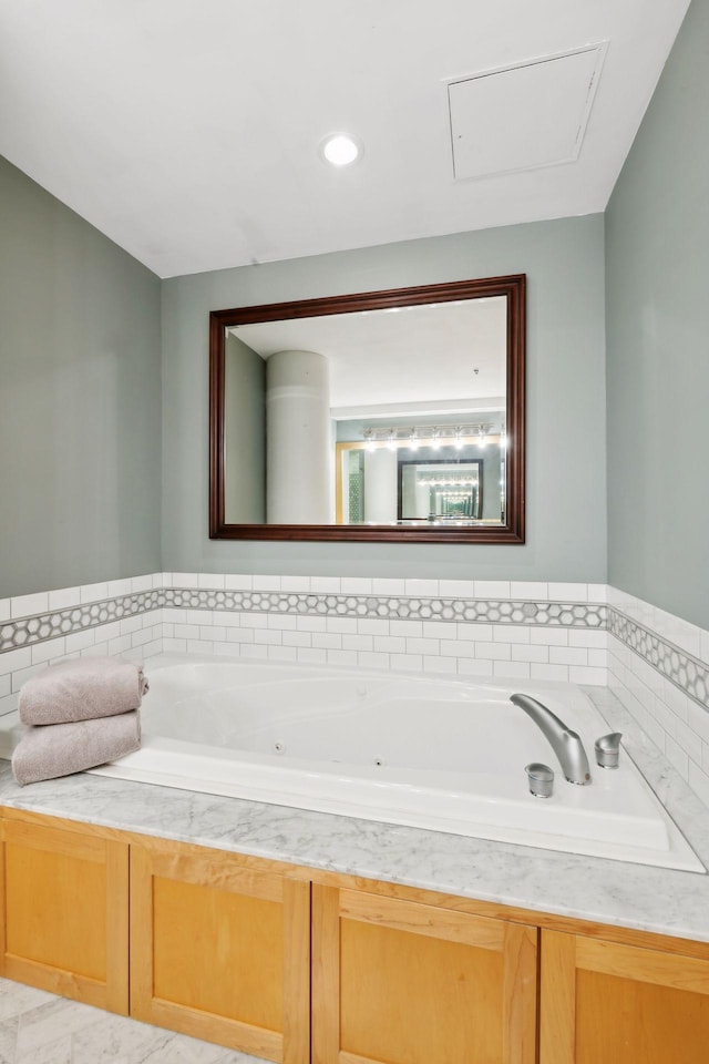 bathroom featuring a jetted tub