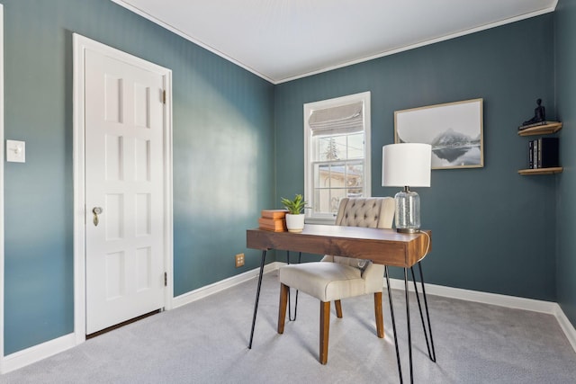 home office with light carpet, baseboards, and ornamental molding