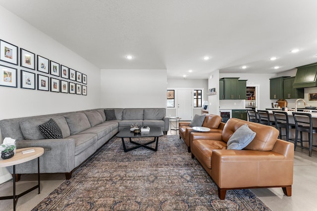 living room featuring recessed lighting