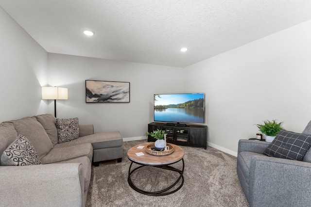 living room featuring a textured ceiling, recessed lighting, carpet, and baseboards