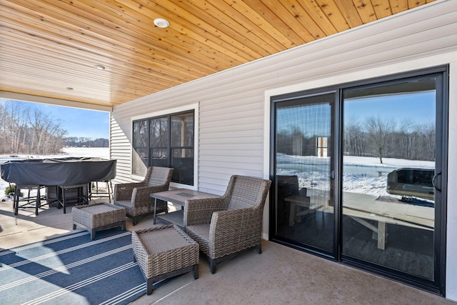 view of snow covered patio