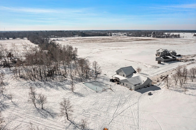 snowy aerial view with a rural view