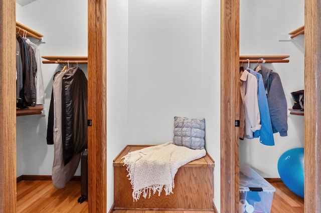 spacious closet featuring wood finished floors