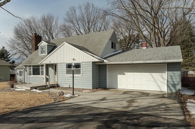 view of front of property with an attached garage, a shingled roof, driveway, board and batten siding, and a chimney