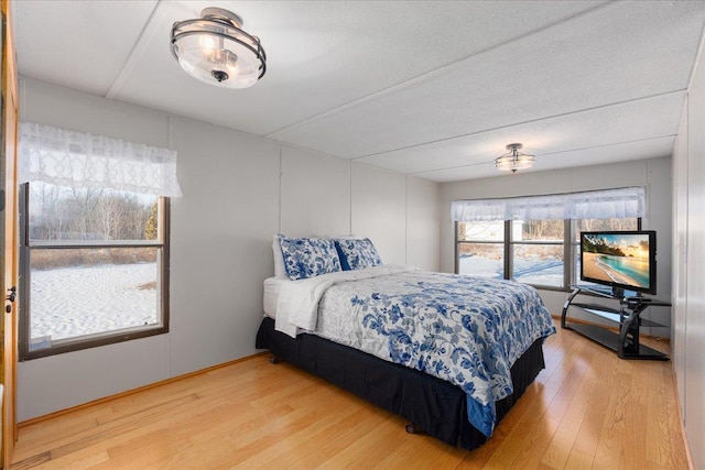 bedroom with wood finished floors