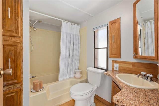 E4970 865th Ave, Sherman Twp, WI 54725 - full bathroom featuring toilet, shower / bath combo with shower curtain, vanity, and wood finished floors