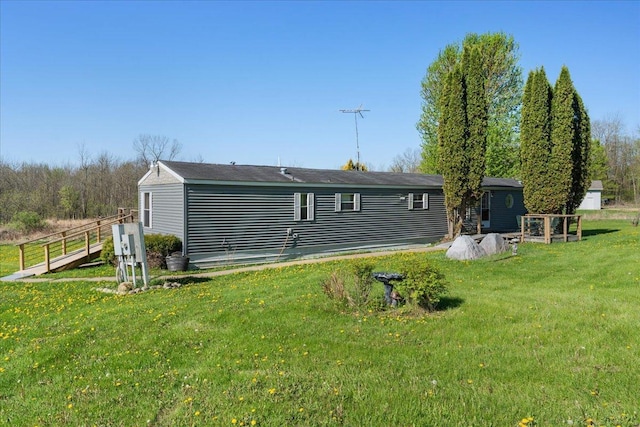 E4970 865th Ave, Sherman Twp, WI 54725 - rear view of house with a lawn