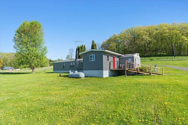 E4970 865th Ave, Sherman Twp, WI 54725 - back of house featuring a yard