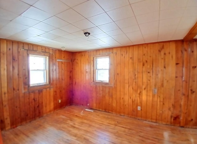 3285 Vermilion Trl, Colvin Twp, MN 55763 - unfurnished room with wood finished floors and wooden walls