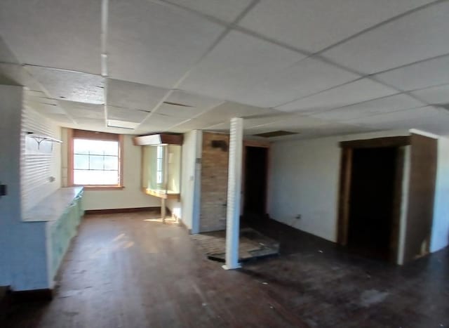 3285 Vermilion Trl, Colvin Twp, MN 55763 - basement with a drop ceiling, baseboards, and wood finished floors