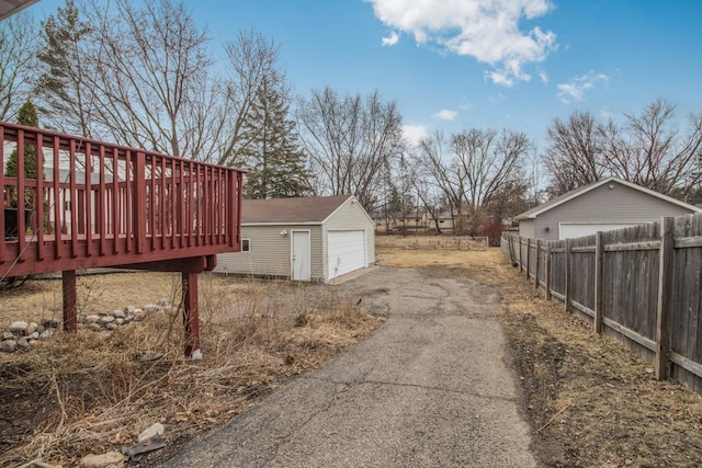 exterior space with aphalt driveway