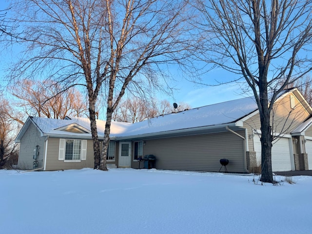 single story home with an attached garage