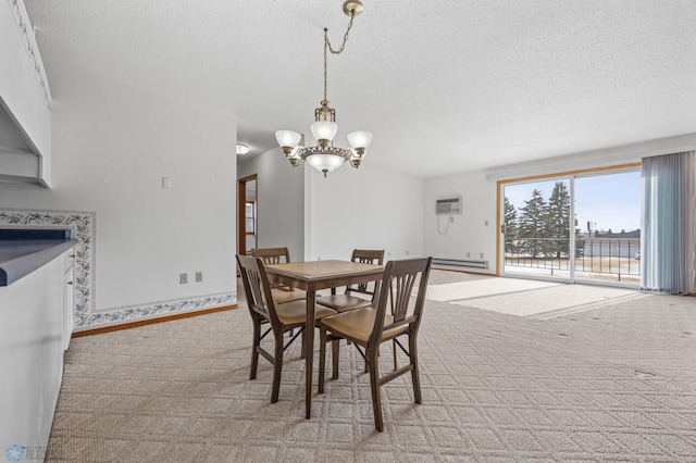 dining area with a baseboard radiator, a textured ceiling, and light colored carpet