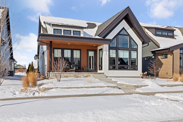 4060 Swallowtail Ln N, Lake Elmo, MN 55042 - view of front of house featuring covered porch and central AC unit