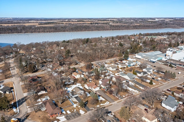 birds eye view of property with a residential view and a water view