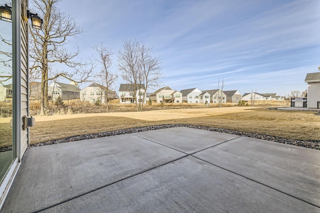 view of patio featuring a residential view