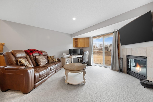 2230 Downing Ave, Shakopee, MN 55379 - living area featuring light carpet, an office area, a tiled fireplace, and recessed lighting