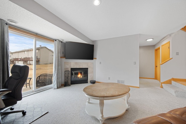 2230 Downing Ave, Shakopee, MN 55379 - living room featuring light colored carpet, a fireplace, baseboards, stairway, and recessed lighting