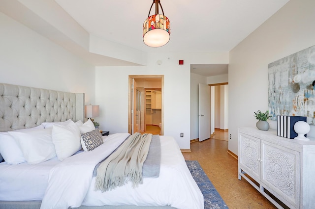 500 Grant St Unit 1302, Minneapolis, MN 55404 - bedroom with a walk in closet and baseboards