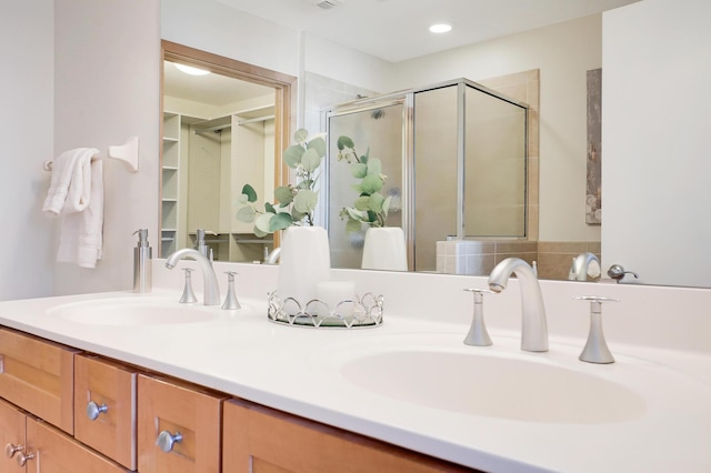 500 Grant St Unit 1302, Minneapolis, MN 55404 - full bathroom with a sink, a stall shower, and double vanity