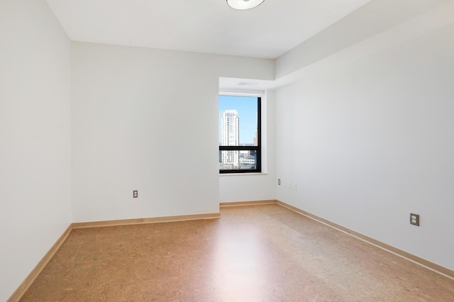 500 Grant St Unit 1302, Minneapolis, MN 55404 - spare room featuring baseboards