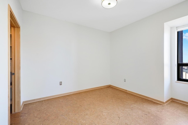500 Grant St Unit 1302, Minneapolis, MN 55404 - spare room featuring baseboards