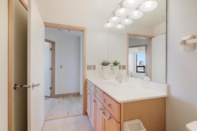 500 Grant St Unit 1302, Minneapolis, MN 55404 - bathroom with vanity and tile patterned floors