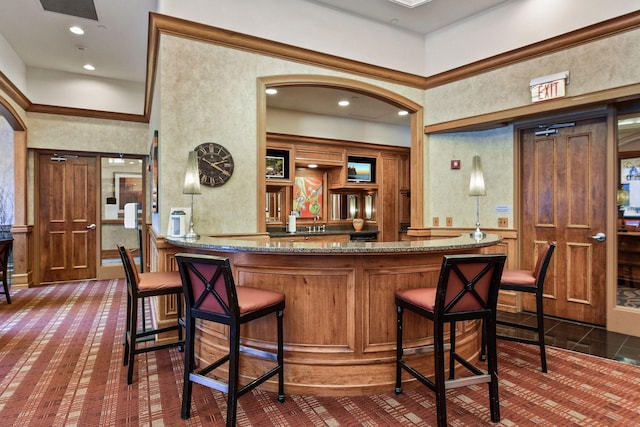500 Grant St Unit 1302, Minneapolis, MN 55404 - bar featuring a community bar, recessed lighting, a sink, and a towering ceiling