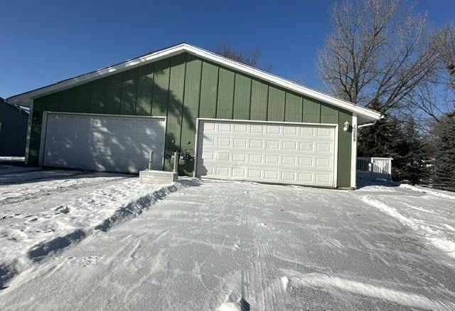 view of snow covered garage