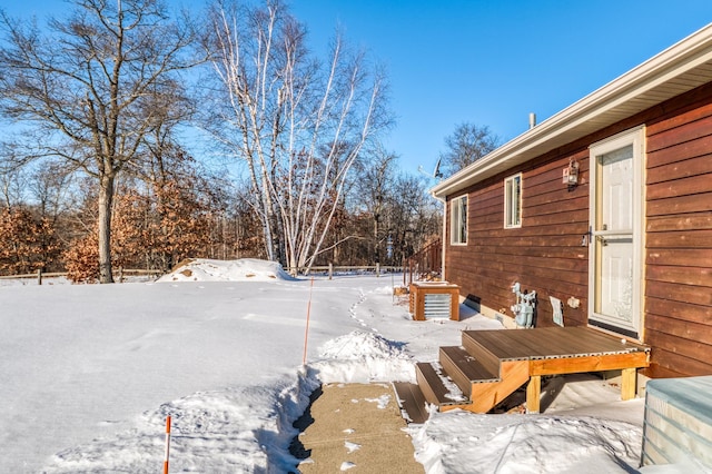 view of yard covered in snow