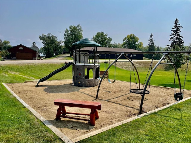 communal playground featuring a lawn