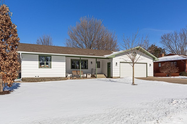 ranch-style home featuring an attached garage