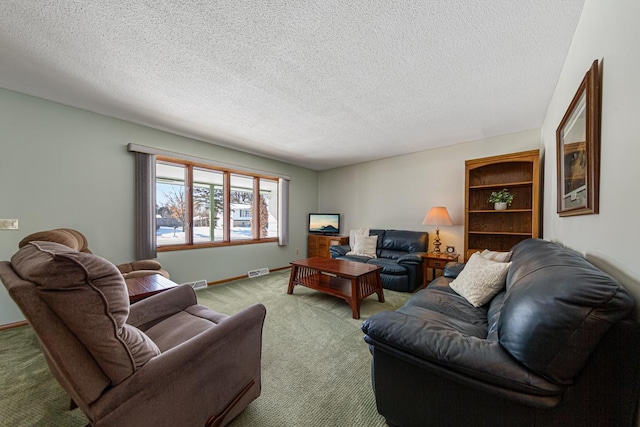 living area featuring a textured ceiling, carpet floors, visible vents, and baseboards