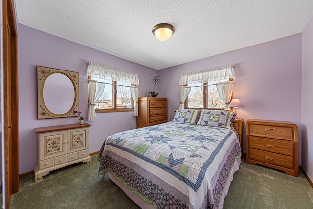 bedroom featuring multiple windows, dark carpet, and baseboards