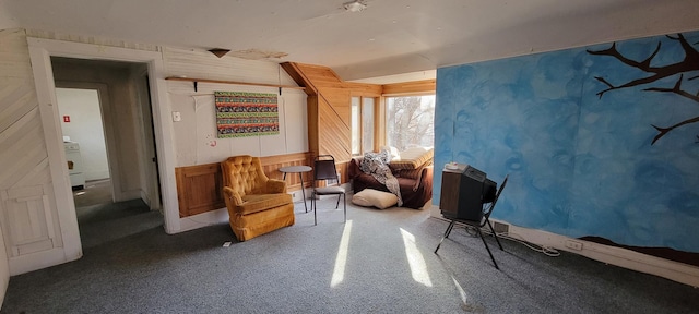 living area featuring carpet flooring