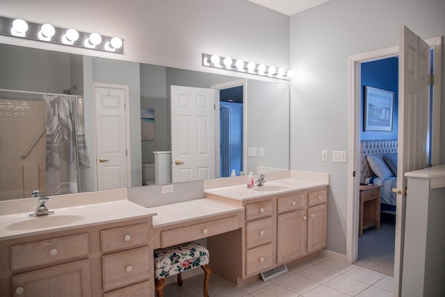 bathroom featuring curtained shower, toilet, vanity, ensuite bath, and tile patterned flooring