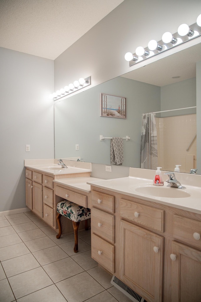 full bathroom with tile patterned flooring, visible vents, vanity, and curtained shower