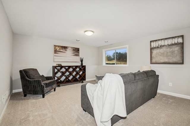 living area featuring light carpet, visible vents, and baseboards