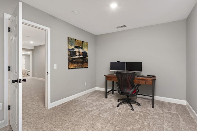 carpeted office space with baseboards, visible vents, and recessed lighting