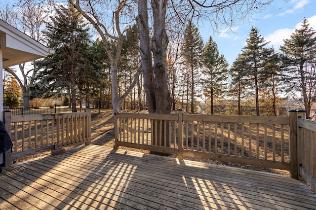 wooden deck featuring fence