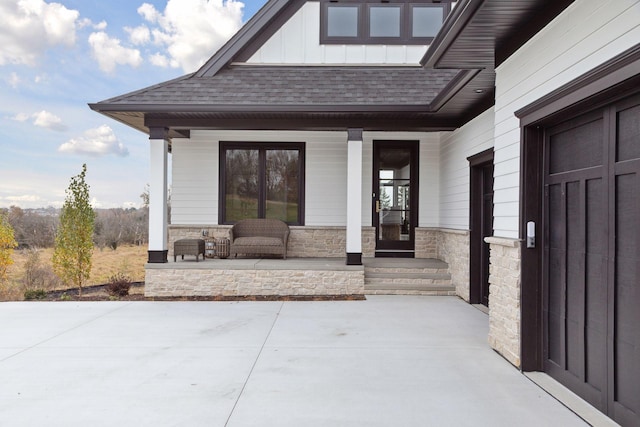 view of patio featuring a porch